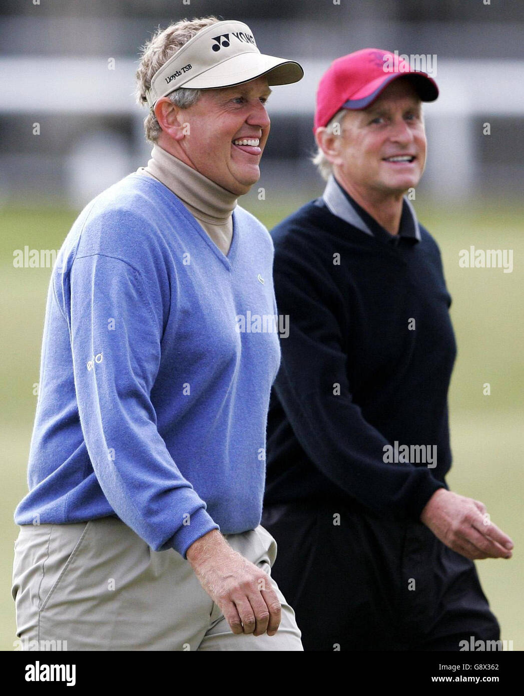 Colin Montgomerie (L) and Michael Douglas during the second round of the Dunhill Links Championships at St Andrews Golf Course, Fife, Scotland, Friday September 30, 2005. PRESS ASSOCIATION Photo. Photo credit should read: Andrew Milligan/PA. Stock Photo