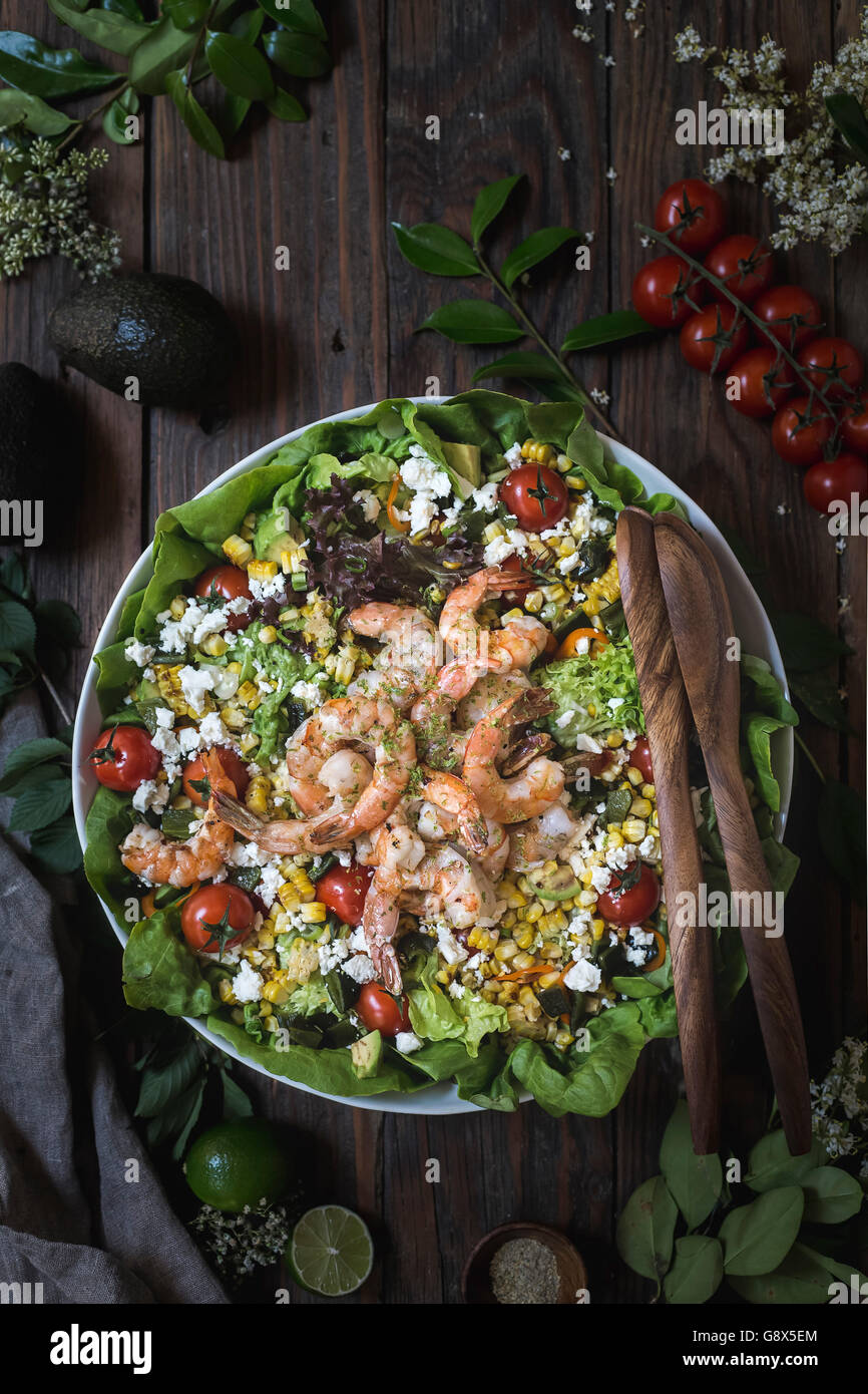 A big bowl of grilled shrimp and corn salad photographed from the top view. Stock Photo