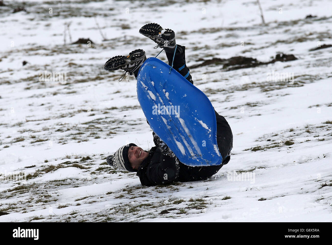 All on sledges in snow hi-res stock photography and images - Alamy