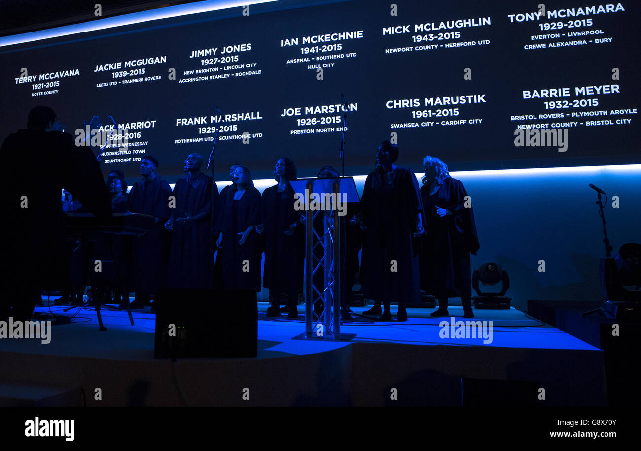 PFA Player of the Year Awards 2016 - Grosvenor House Hotel. People who have passed away in the last year are displayed on the big screen Stock Photo