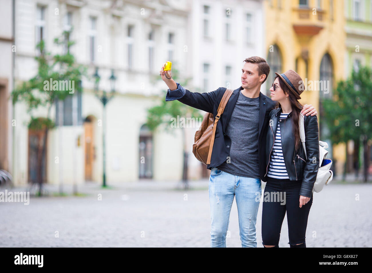 Selfie photo by caucasian couple traveling in Europe. Romantic travel woman  and man in love smiling happy taking self portrait outdoor during vacation  holidays in Prague Stock Photo - Alamy