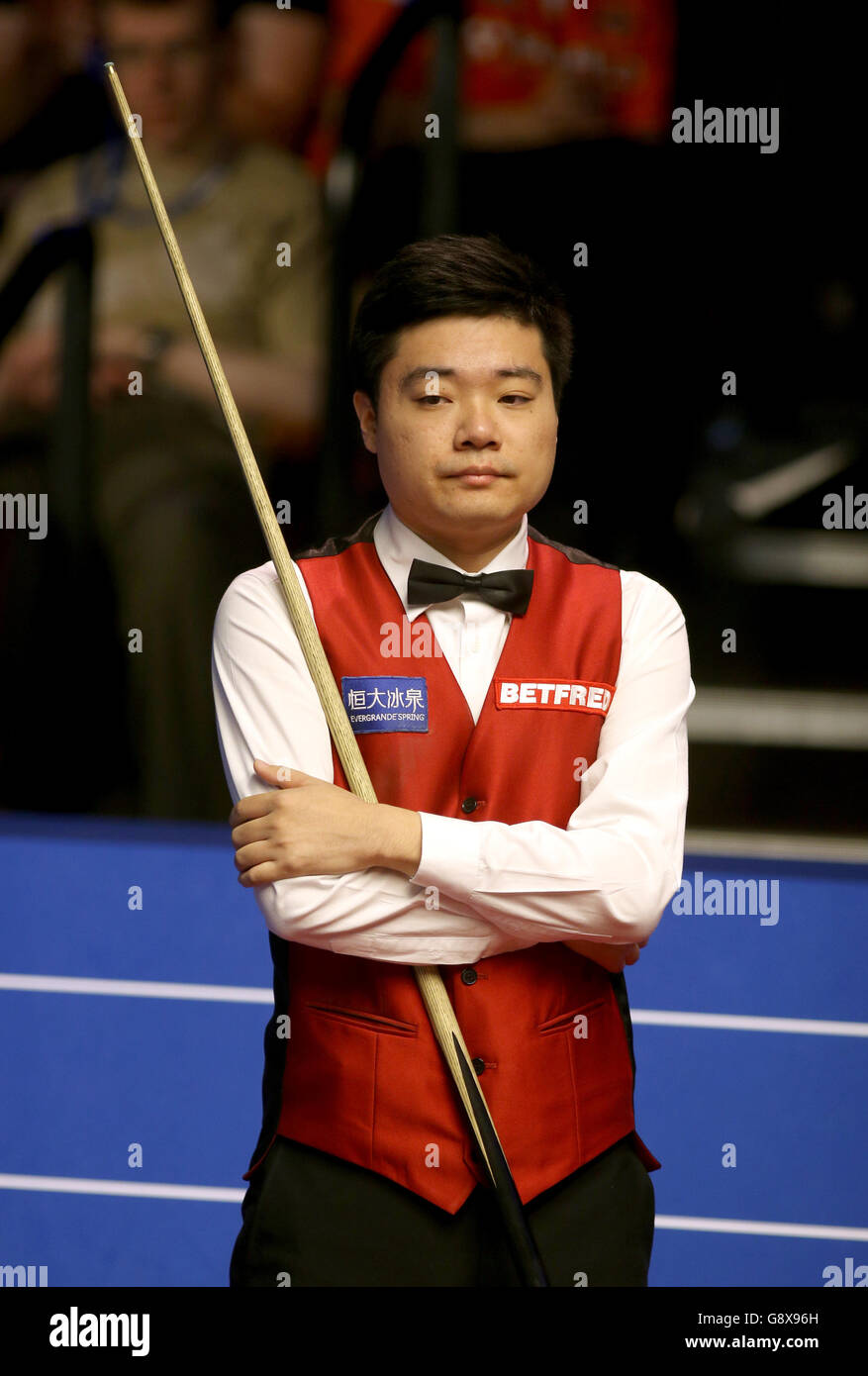 Ding Junhui during day nine of the Betfred Snooker World Championships at the Crucible Theatre, Sheffield. Stock Photo