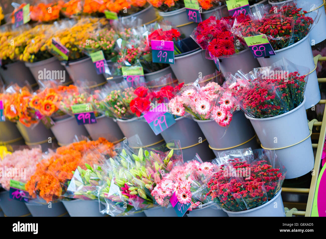 Street flower market with various multicolored fresh flowers outdoors in Europe Stock Photo