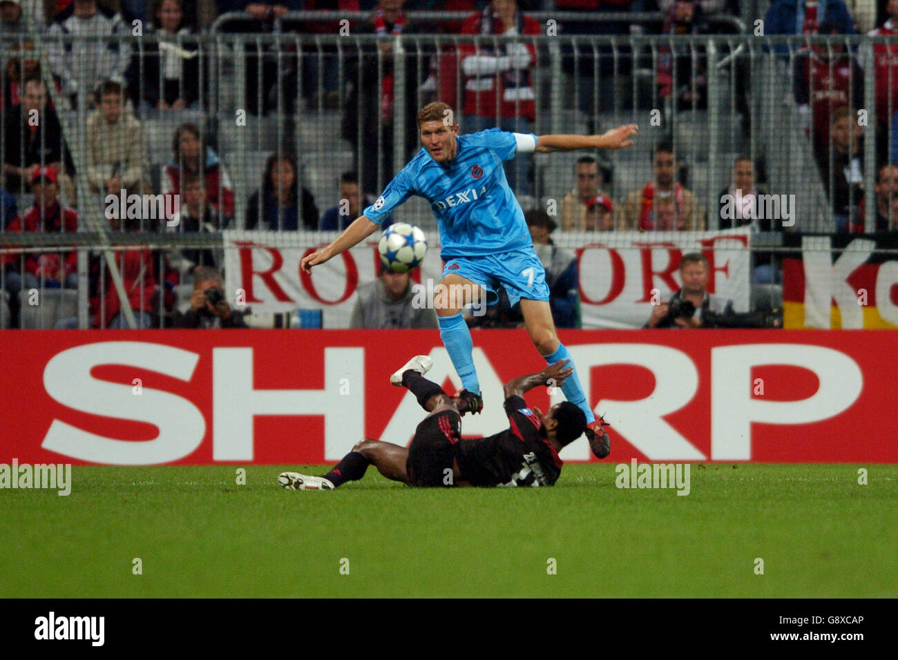 Bayern Munich's Ze Roberto and Club Brugge's Gert Verheyen battle for the ball Stock Photo