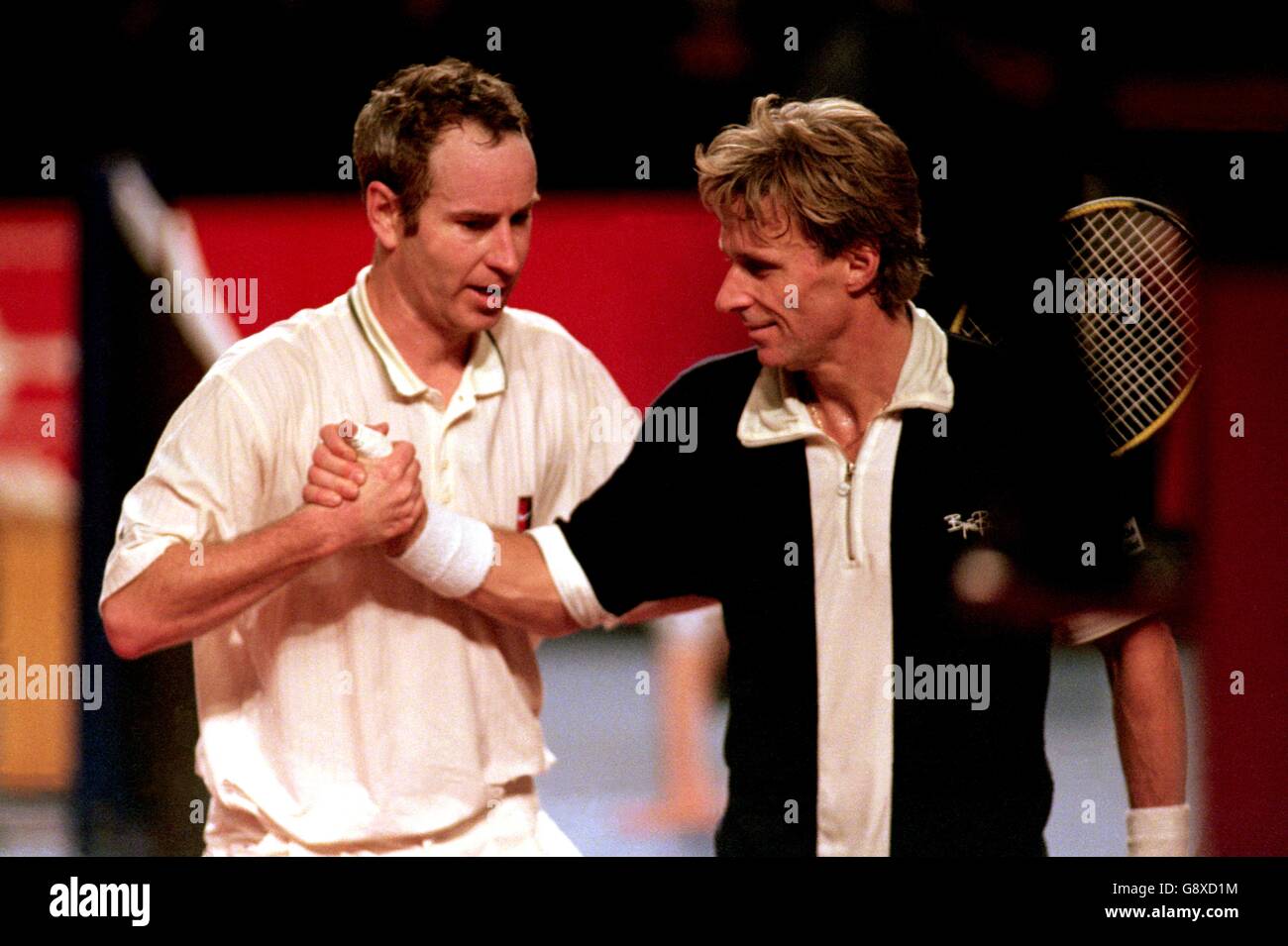 John McEnroe (left) shakes hands with Bjorn Borg (right) after McEnroe's  victory Stock Photo - Alamy