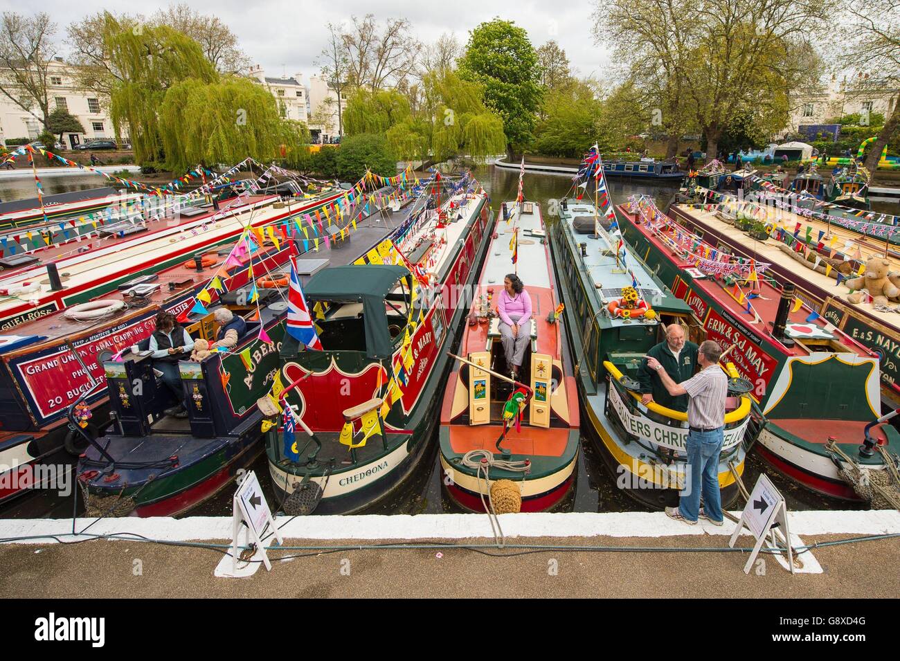 A general view of canal boats during the Inland Waterways Association's annual Canalway Cavalcade festival, at Little Venice, London, which since 1983 has featured a gathering of decorated narrow boats taking part in competitions and parades. Stock Photo