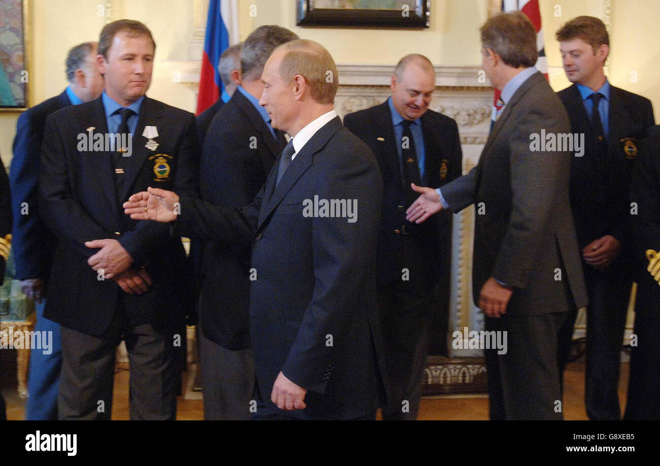 Russian President Vladimir Putin and British Prime Minister Tony Blair meet the rescuers of the Russian submersible, AS28 Priz in August at at Downing Street, Wednesday October 5, 2005. See PA Story DEFENCE Putin. PRESS ASSOCIATION Photo. Photo credit should read: Stefan Rousseau/PA/WPA Rota Stock Photo