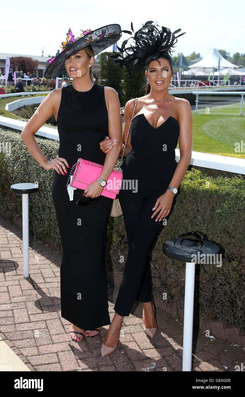 Louise Cunliffe (left) and Katie Daley, during Boodles Ladies Day of the Boodles May Festival at Chester Racecourse. Stock Photo