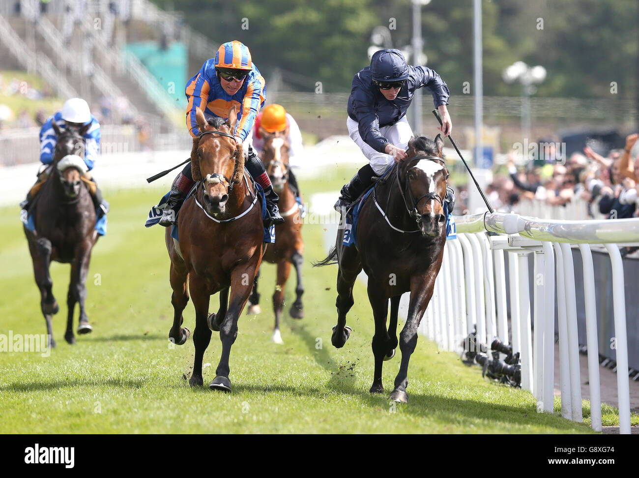 US Army Ranger (right) ridden by Ryan Moore wins The MBNA Chester Vase from Port Douglas (left), during Boodles Ladies Day of the Boodles May Festival at Chester Racecourse. Stock Photo