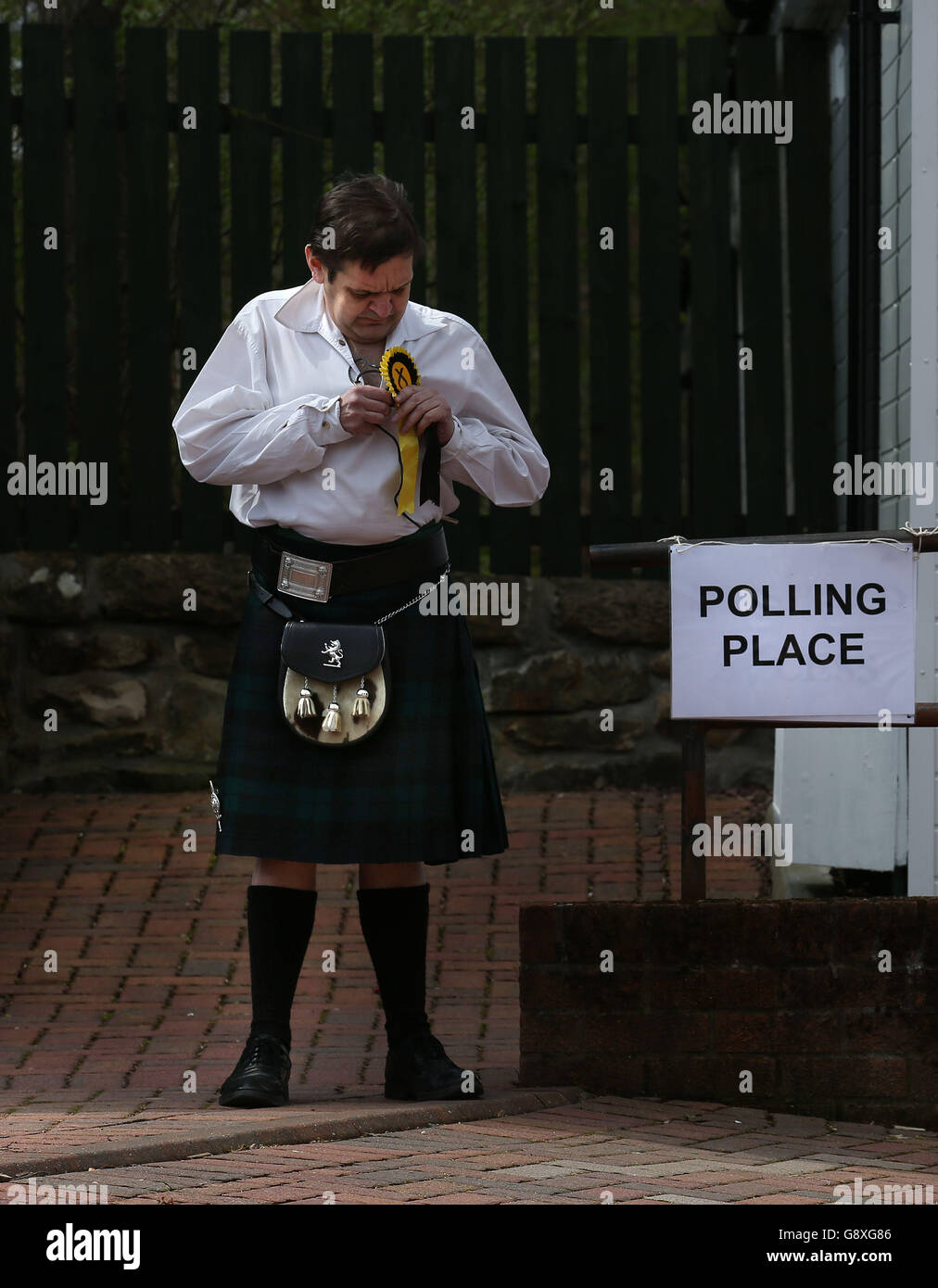 SNP supporter John Watson outside Fankerton Hut polling station in central Scotland as voting continues in the Scottish parliamentary elections. Stock Photo