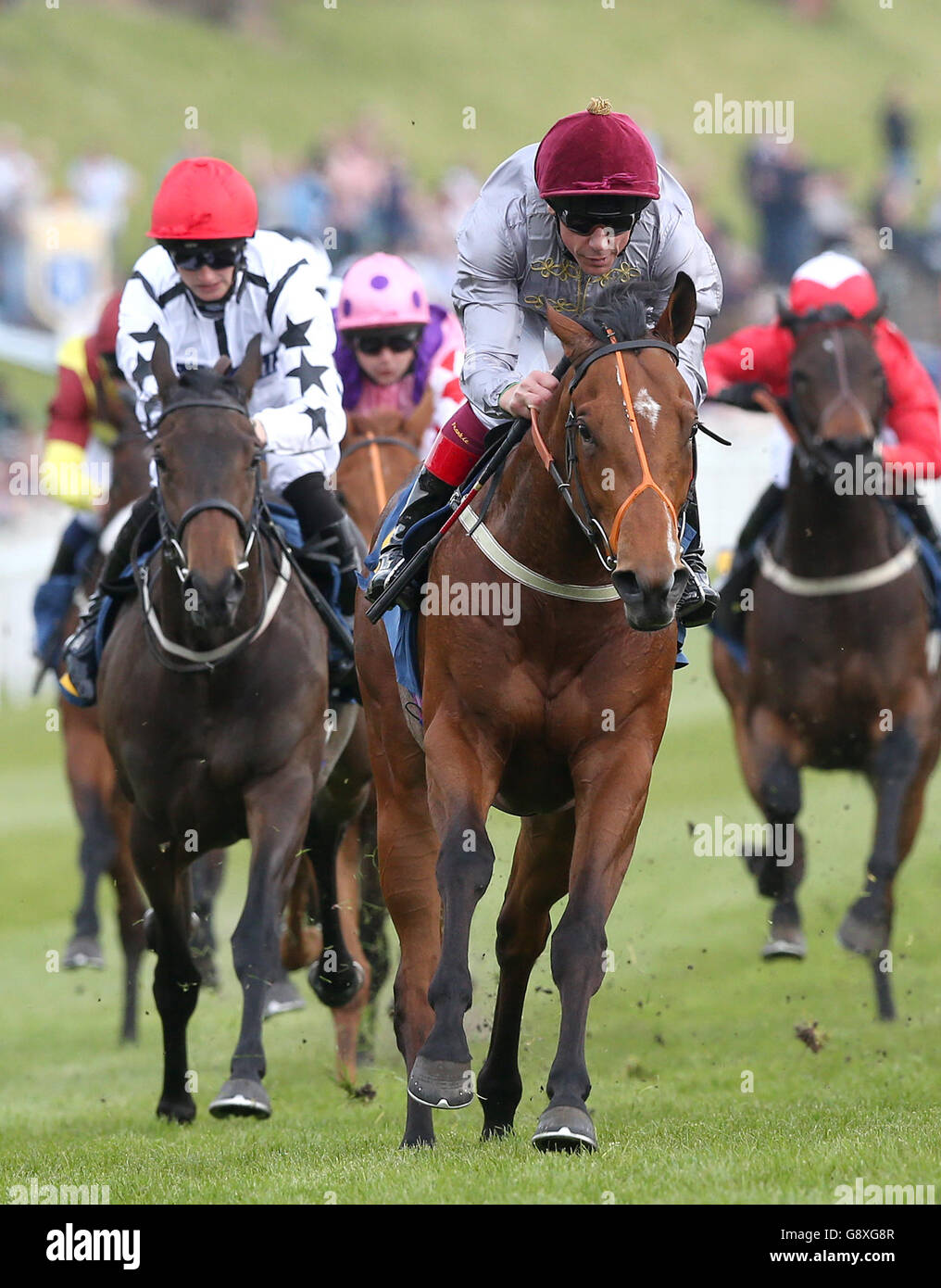 Mehmas (centre) ridden by Frankie Dettori wins The Betway EBF Stallions Maiden Stakes, during Boodles Ladies Day of the Boodles May Festival at Chester Racecourse. Stock Photo
