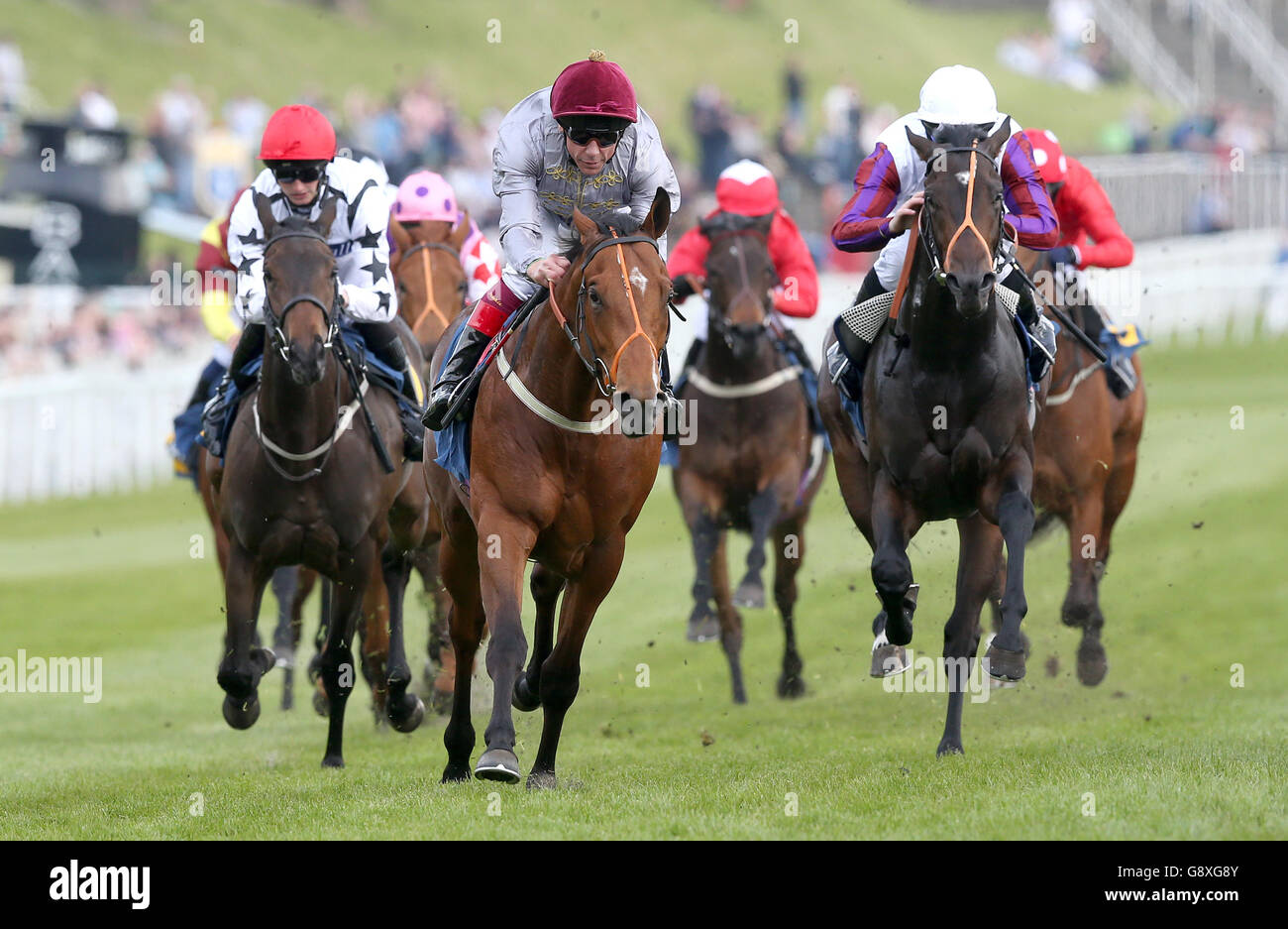 Mehmas (centre) ridden by Frankie Dettori wins The Betway EBF Stallions Maiden Stakes, during Boodles Ladies Day of the Boodles May Festival at Chester Racecourse. Stock Photo