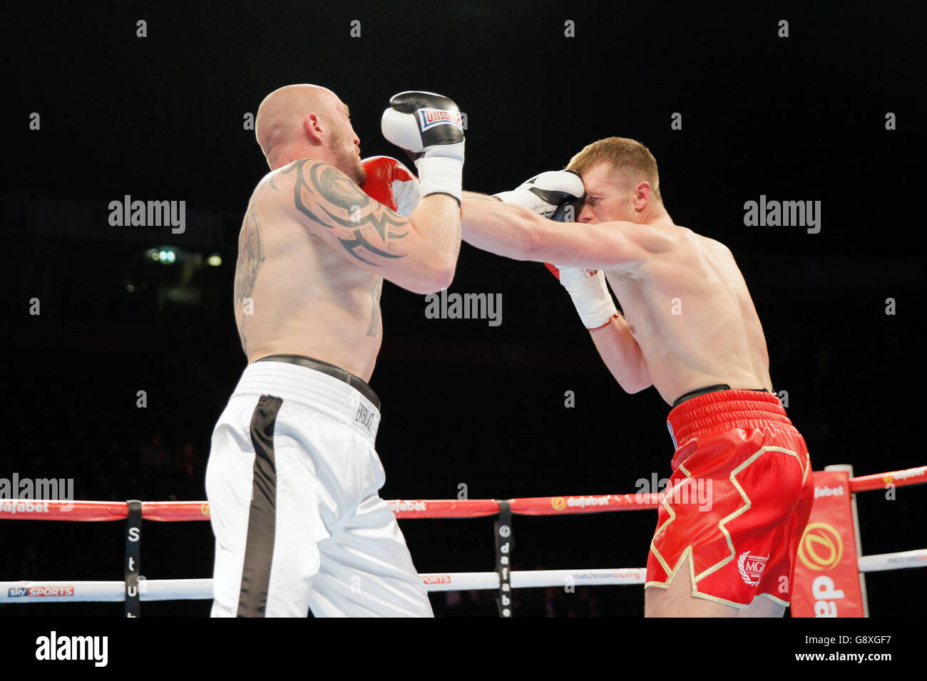 Warren Baister (right) and Stanislav Eschner during the Cruiserweight contest at the Manchester Arena. Stock Photo