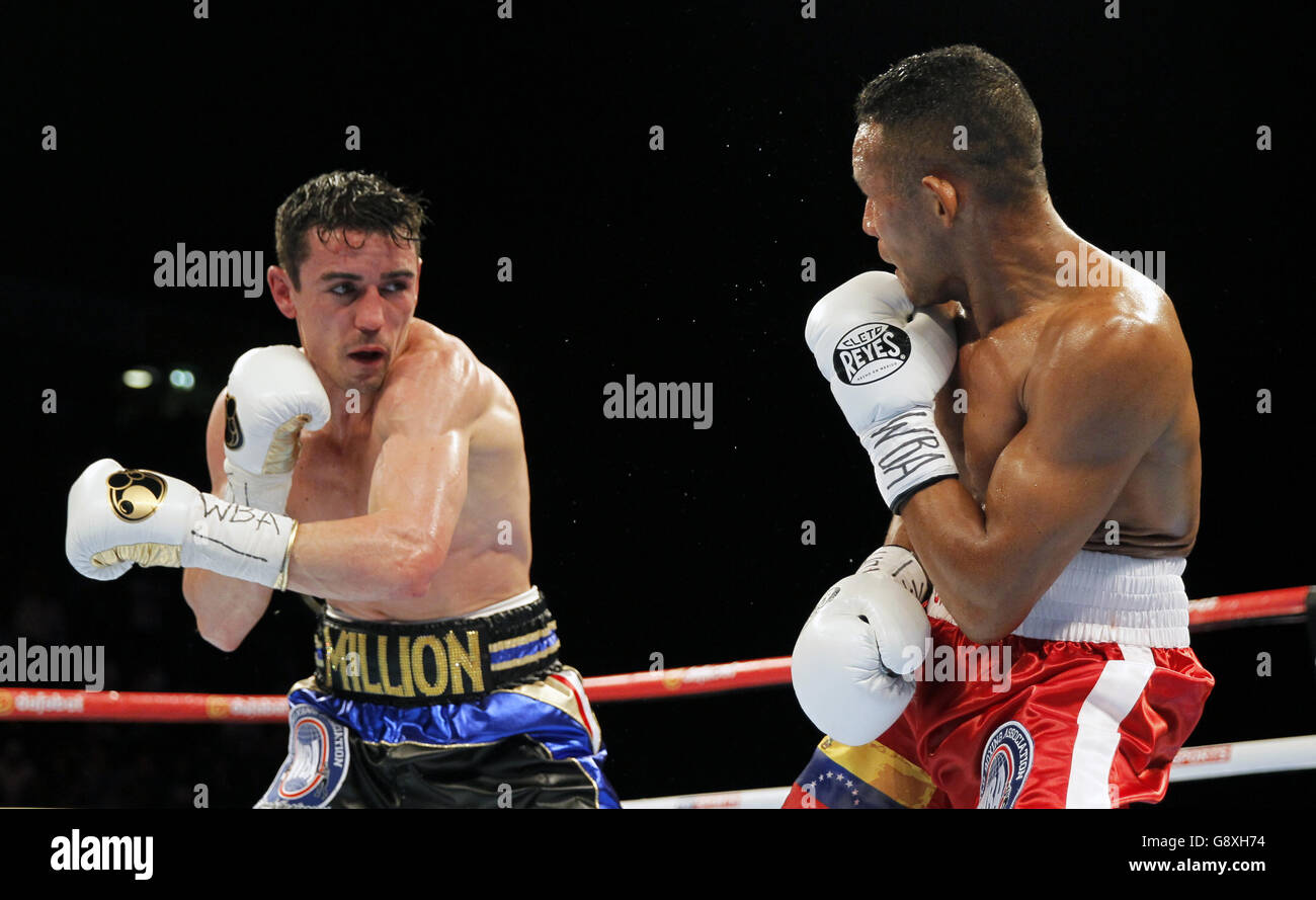 Anthony Crolla (left) and Ismael Barroso during the WBA World Lightweight Title bout at the Manchester Arena. Stock Photo