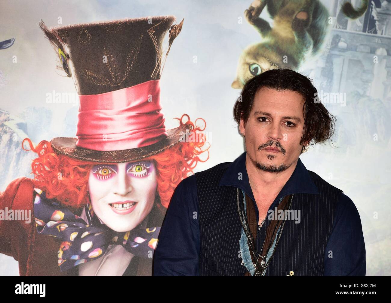 Johnny Depp attending a photocall for new film Alice Through the