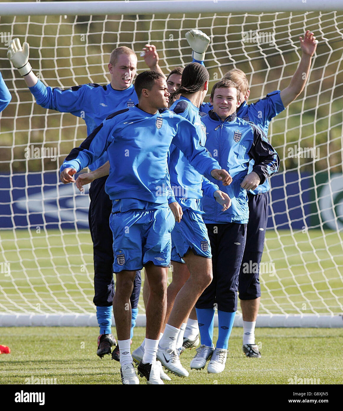 England's Kieron Dyer, Rio Ferdinand Wayne Rooney and Chris Kirkland during a training session at Carrington training ground, Manchester, Monday October 10, 2005, ahead of their World Cup qualifying match against Poland on Wednesday. PRESS ASSOCIATION Photo. Photo credit should read: Martin Rickett/PA. Stock Photo