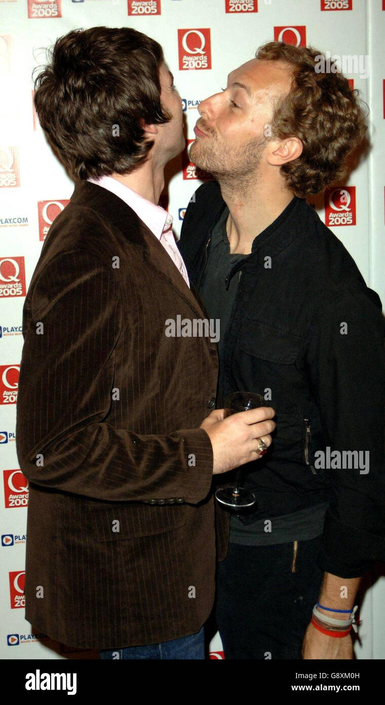 Chris Martin Of Coldplay R Kisses Noel Gallagher During The Annual Q 