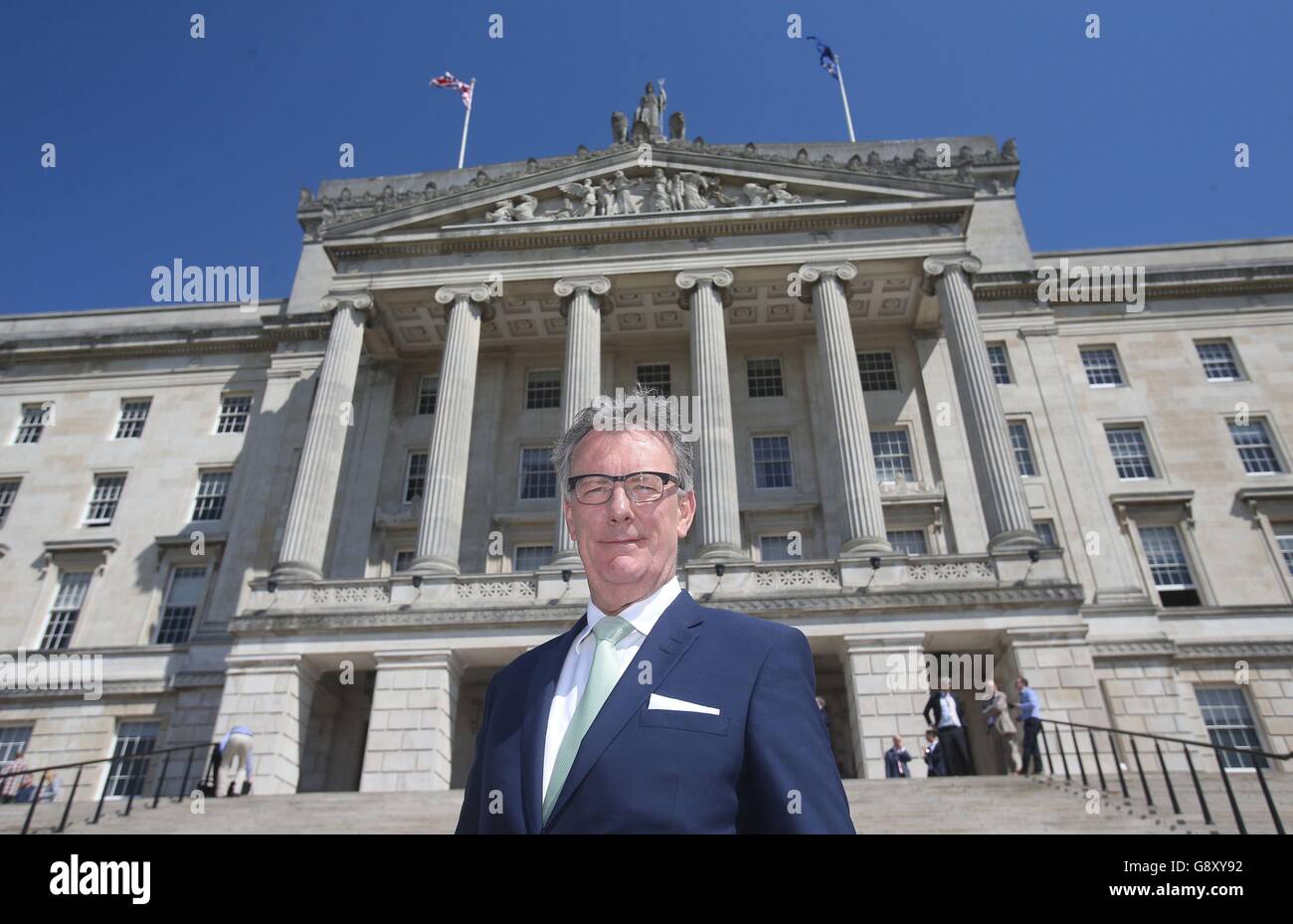 Leader of the Ulster Unionist Party Mike Nesbitt outside Parliament Buildings in Stormont, Belfast, as parties begin talks to form a new government following the weekends assembly elections. Stock Photo