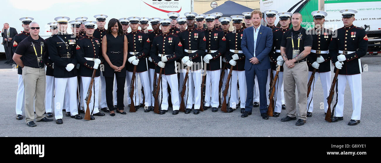 Prince Harry and First Lady Michelle Obama pose with the US Marine Corps Silent Drill Platoon ahead of the Opening Ceremony of the Invictus Games Orlando 2016 at ESPN Wide World of Sports in Orlando, Florida. Stock Photo