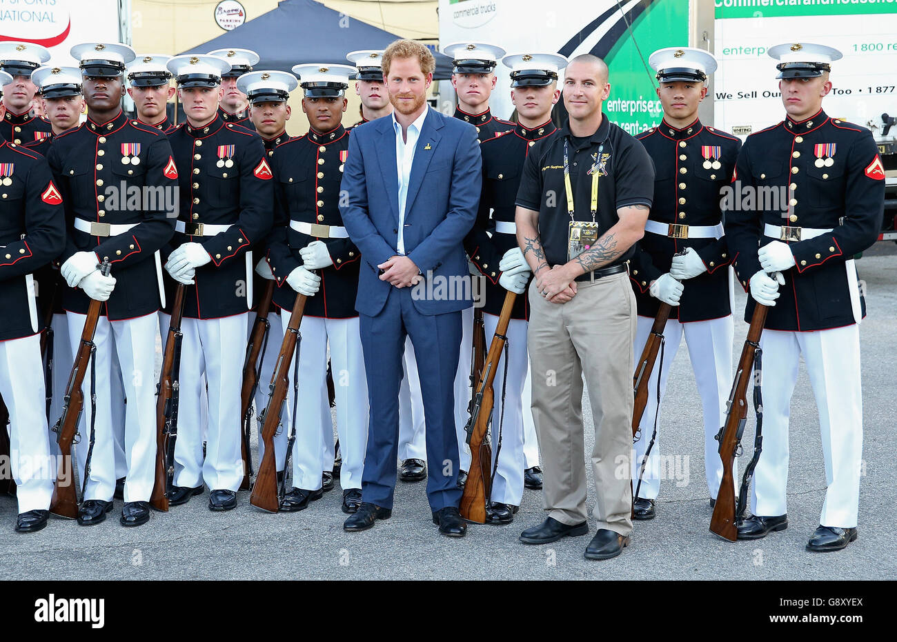 Prince Harry poses with the US Marine Corps Silent Drill Platoon ahead of the Opening Ceremony of the Invictus Games Orlando 2016 at ESPN Wide World of Sports in Orlando, Florida. Stock Photo