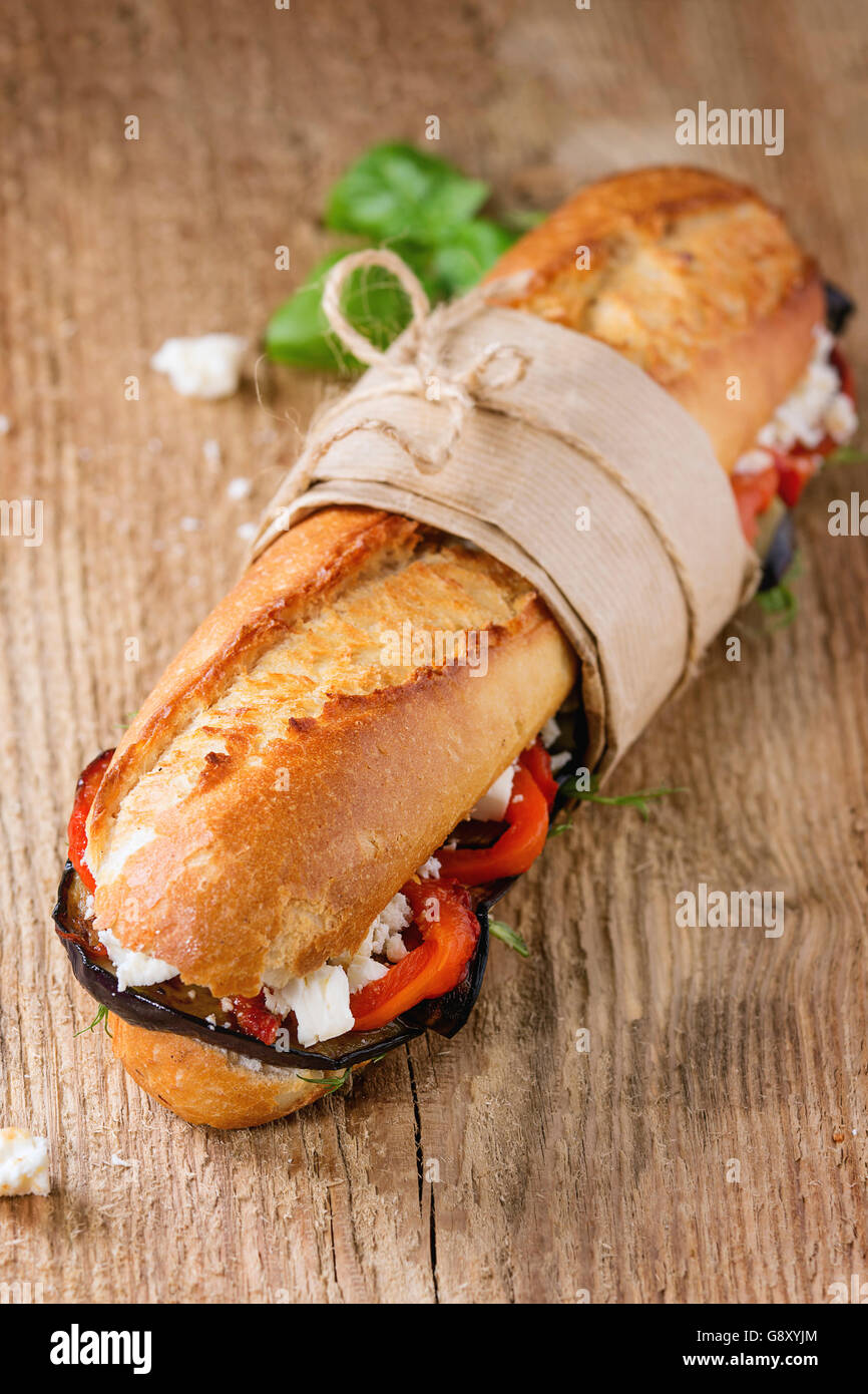 Papered vegetarian baguette submarine sandwich with grilled eggplant