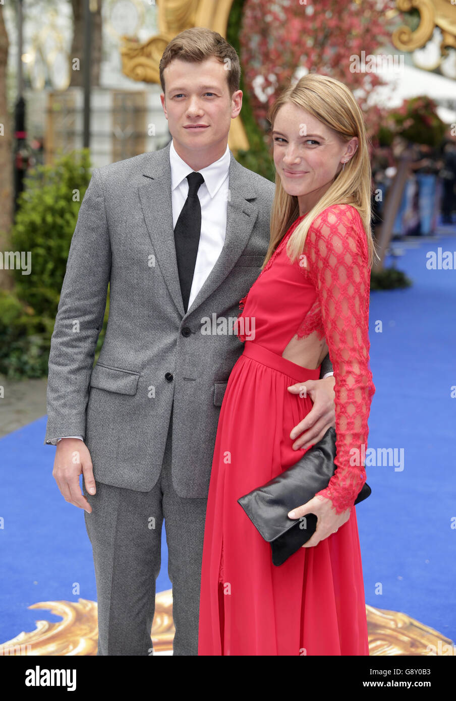 Ed Speleers and Asia Macey attending the Alice Through The Looking