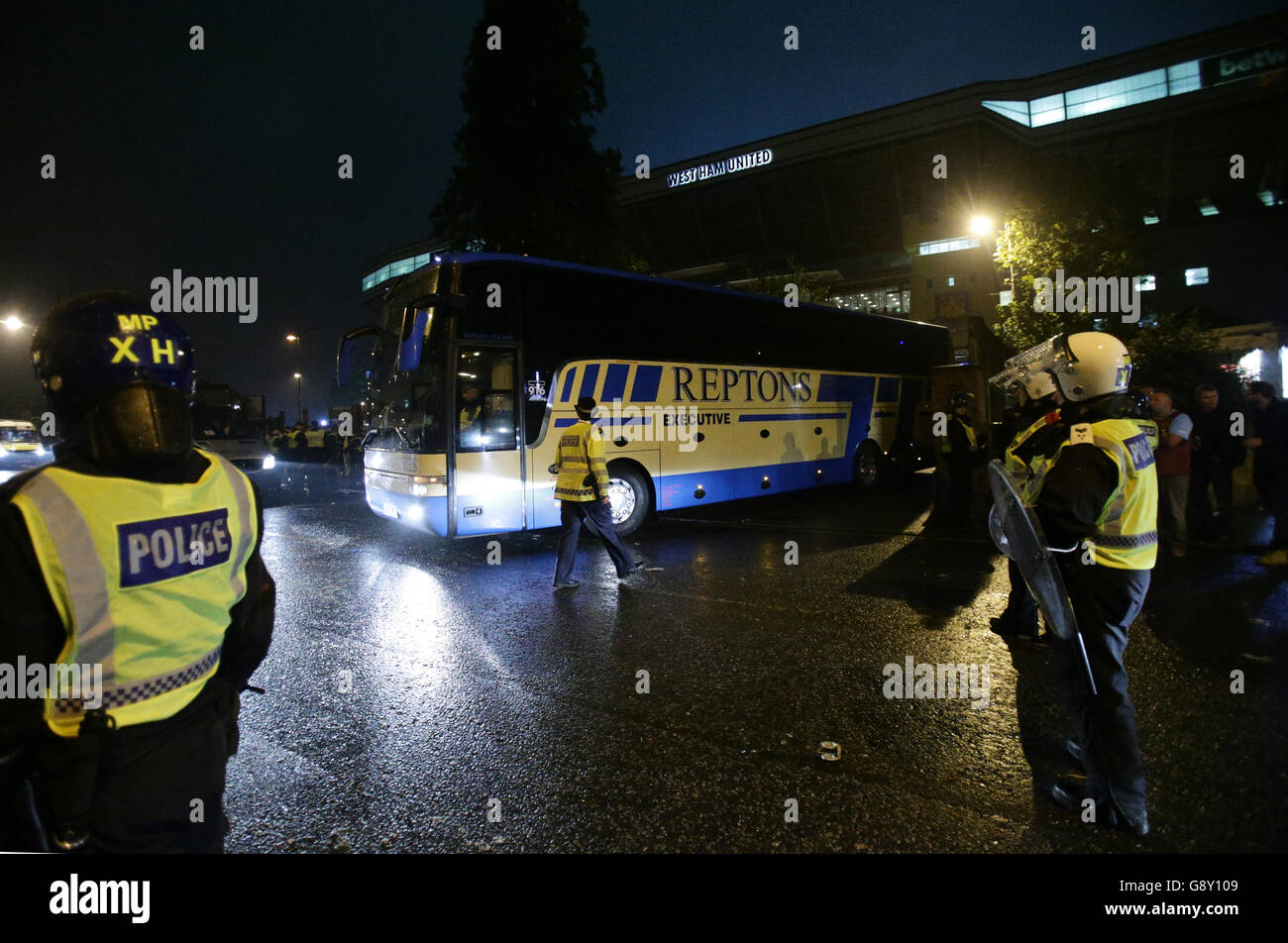 A replacement coach is reversed into the stadium which is believed to be for the Manchester United team at Upton Park. Stock Photo