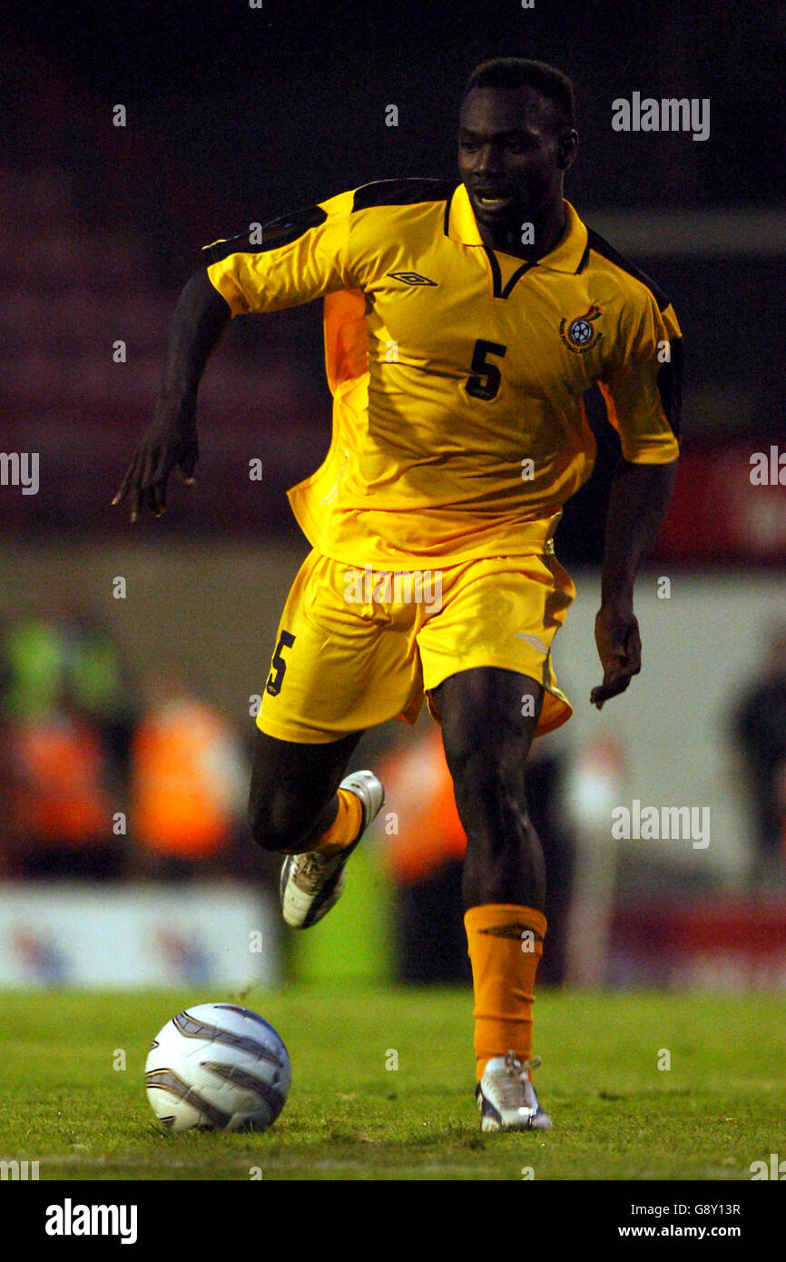 Soccer - International Friendly - Senegal v Ghana - Griffin Park. John Mensah, Ghana Stock Photo