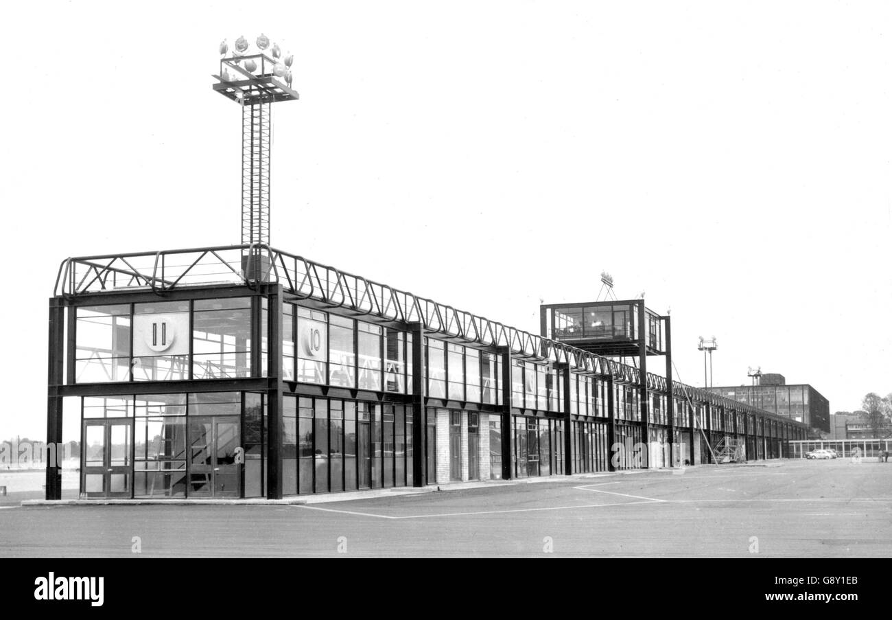 The new terminal building of Gatwick Airport, Sussex, to be opened by Queen Elizabeth II on June 9th 1958. The long, two-storey structure provides a covered passage from the main buildings towards the runways. Passengers pass along the upper level then descend by numbered staircases to doorways at the sides ands of the long building. *Neg corrupt. Scanned from print Stock Photo
