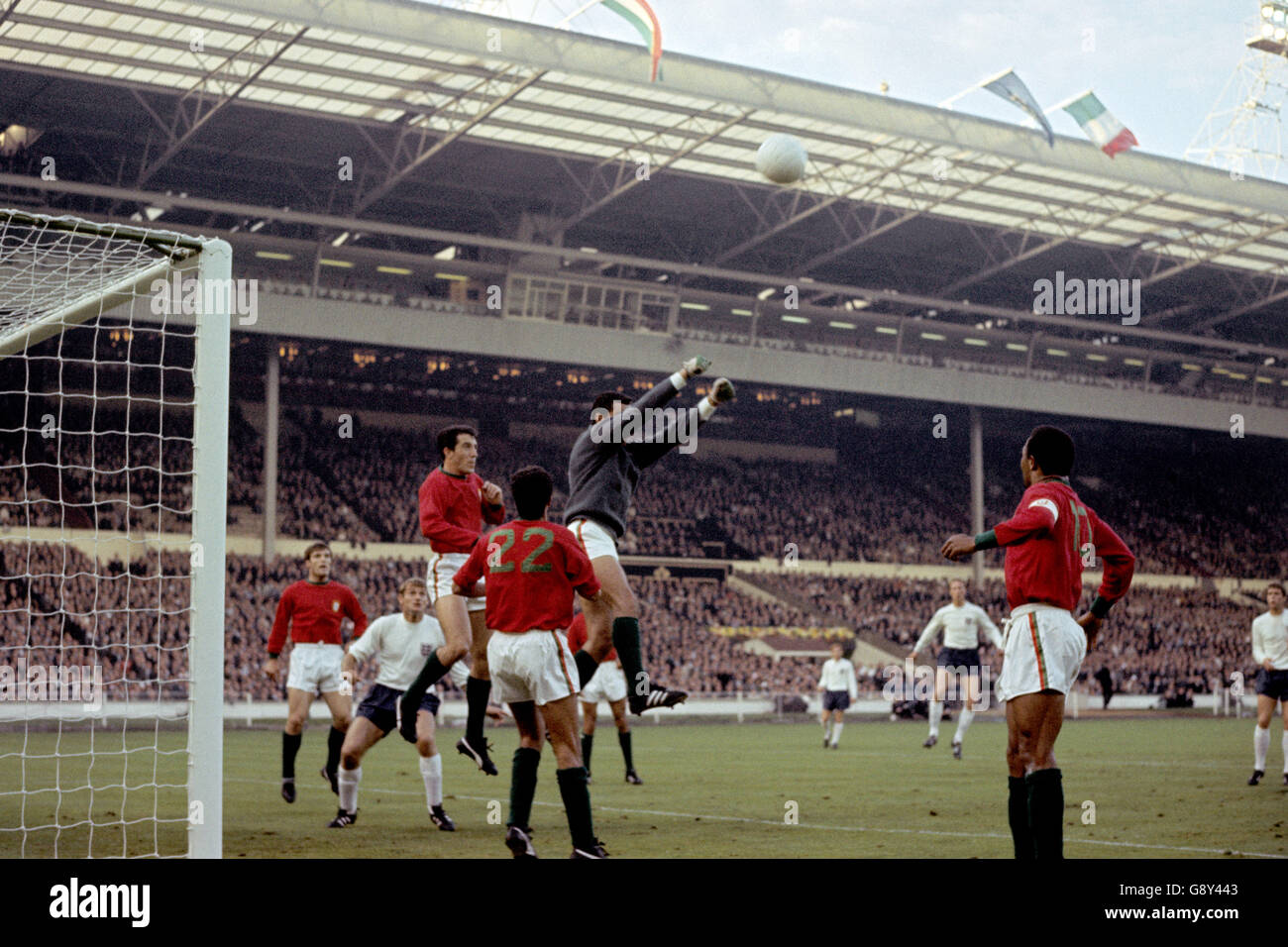 Soccer - World Cup England 1966 - Semi Final - Portugal v England - Wembley Stadium. Portugal goalkeeper Jose Pereira clears the ball Stock Photo