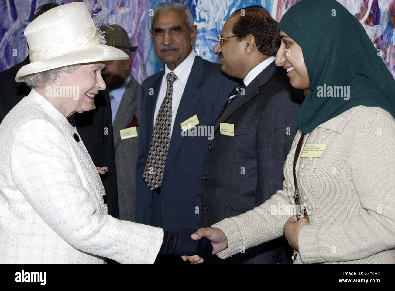 Britain's Queen Elizabeth II meets Eram Javid, a member of the Kashmir comumity at Sage Music Centre in Gateshead, Friday October 14, 2005. See PA Story ROYAL Queen. PRESS ASSOCIATION Photo. Photo credit should read: Owen Humphreys/PA/WPA Rota Stock Photo