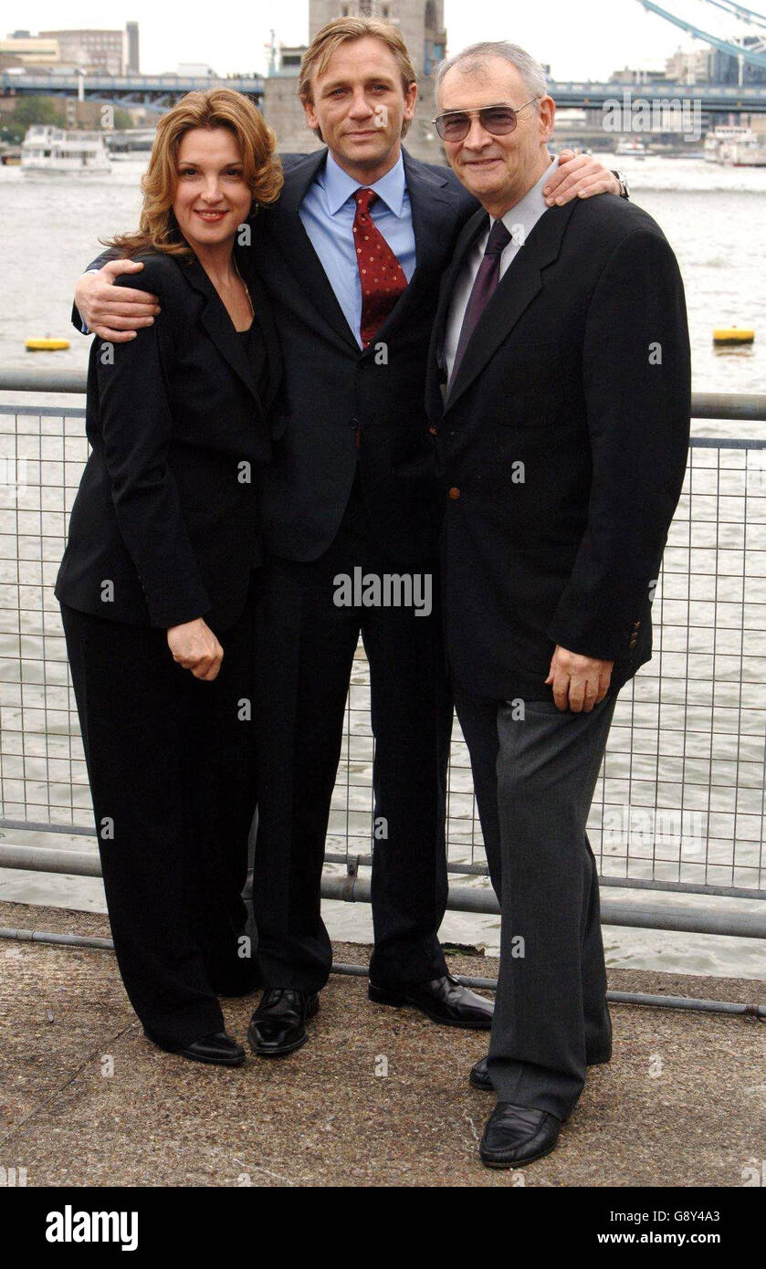 Actor Daniel Craig, with producers Barbara Broccolli and Michael G.Wilson (R), is unveiled as the new James Bond 007 ahead of the forthcoming filming of the 21st installment in the series, 'Casino Royale', at HMS President, east London, Friday 14 October 2005. See PA story SHOWBIZ Bond. PRESS ASSOCIATION Photo. Photo credit should read: Ian West/PA Stock Photo