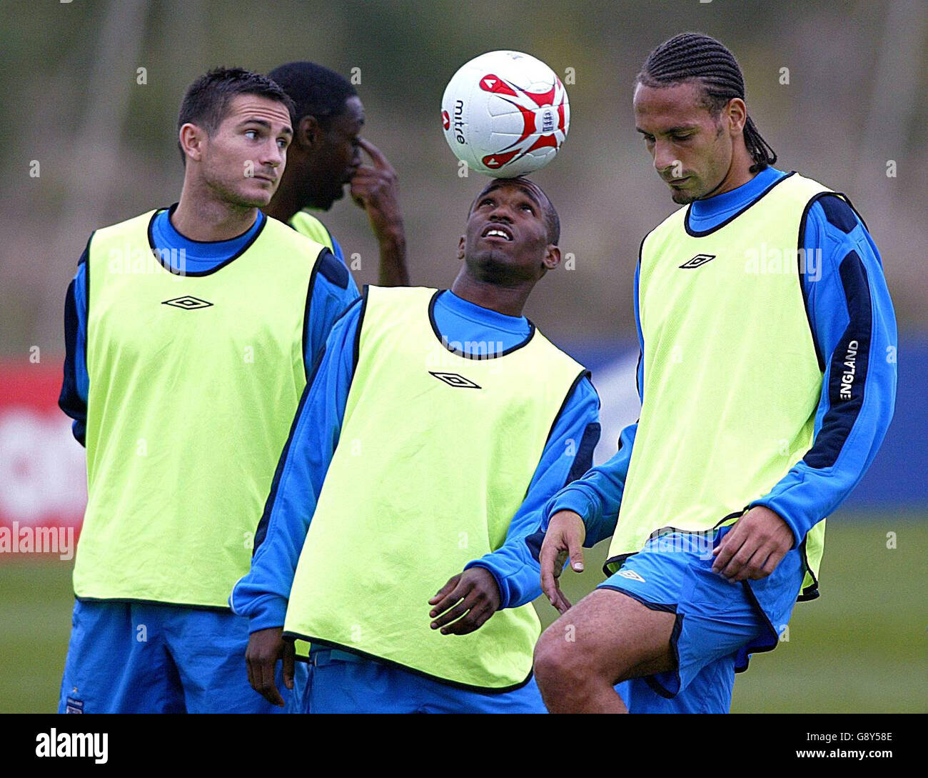 England's (from L-R) Frank Lampard, Jermain Defoe and Rio Ferdinand during a training session at Carrington Training Ground, Manchester, Tuesday October 4, 2005. England play Austria in their World Cup qualifying match on Saturday. PRESS ASSOCIATION Photo. Photo credit should read: Martin Rickett/PA. Stock Photo