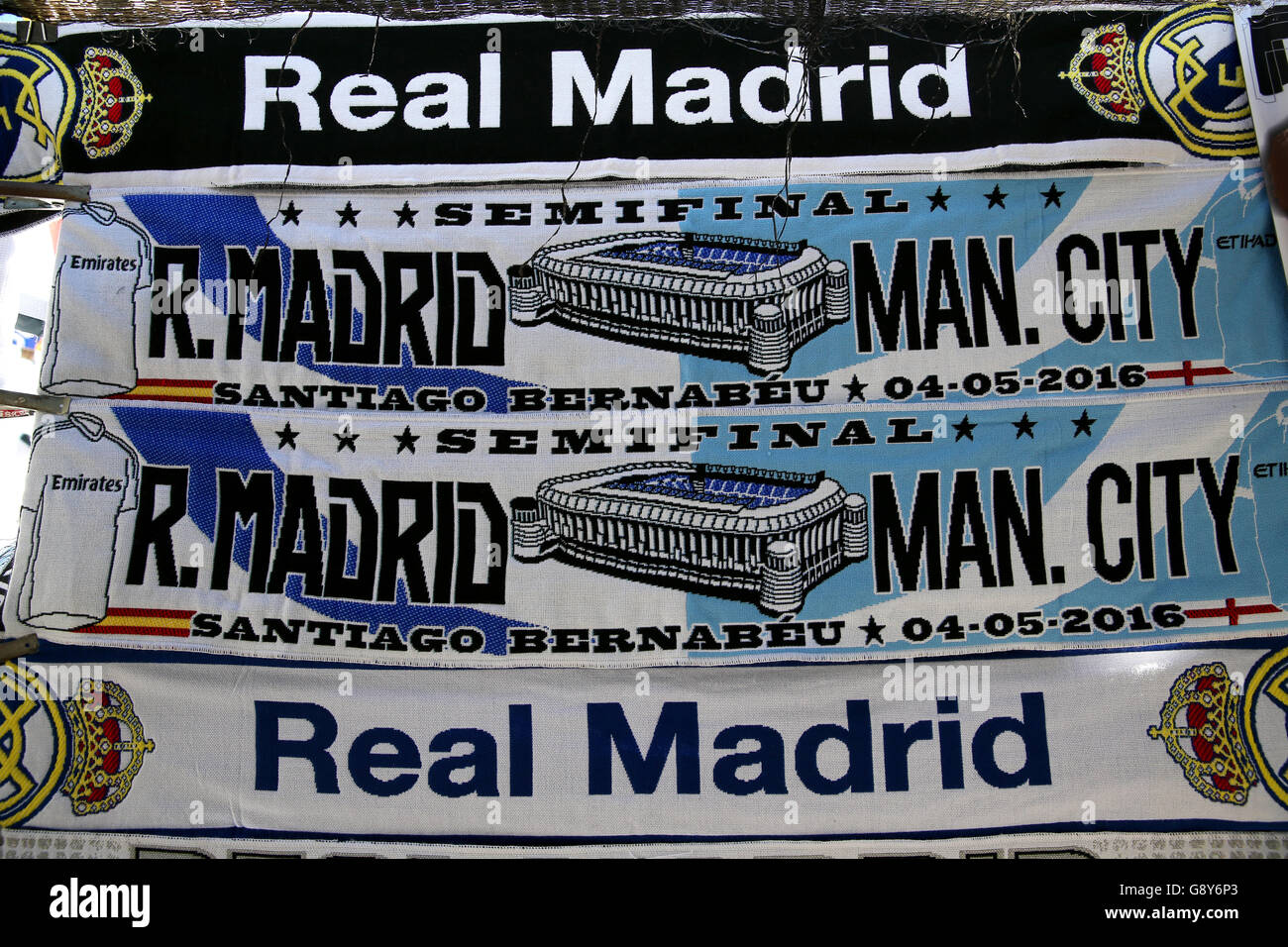 A general view of Real Madrid and Manchester City half and half scarves outside the stadium prior to the UEFA Champions League Semi Final, Second Leg match at the Santiago Bernabeu, Madrid. PRESS ASSOCIATION Photo. Picture date: Wednesday May 4, 2016. See PA story SOCCER Real Madrid. Photo credit should read: Adam Davy/PA Wire Stock Photo