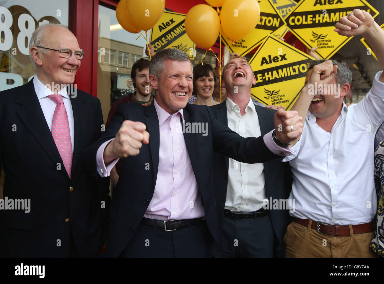 (left to right) Former Liberal Democrat leaders Menzies Campbell, Scottish Liberal Democrat leader Wiilie Rennie, Liberal Democrat leader Tim Farron and Lib Dem Alex Cole-Hamilton, as they celebrate in Edinburgh, after Rennie and Cole-Hamilton both won their seats in the Scottish parliamentary elections. Stock Photo
