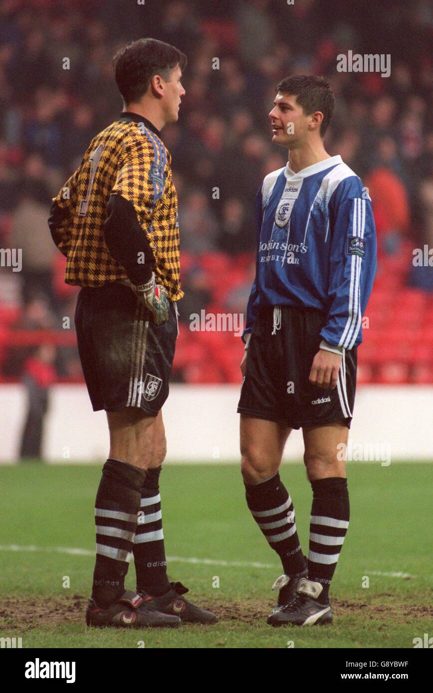 Stockport's Eric Nixon and Tom Bennett talk to each other Stock Photo