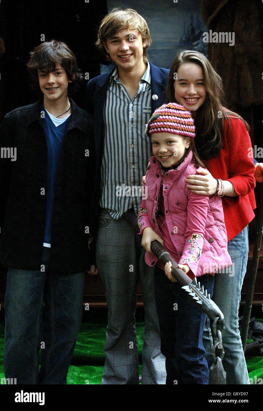 Stars from the new film 'The Chronicles of Narnia' - From left; Skandar Keynes (Edmund), William Moseley (Peter), Georgie Henly (Lucy, front) and Anna Popplewell (Susan) during the launch of the tenth National Schools Film Week at the Odeon Cinema in Leicester Square, central London, Wednesday 12 October 2005. See PA story SHOWBIZ Narnia. PRESS ASSOCIATION Photo. Photo Credit should read: Steve Parsons/PA. Stock Photo