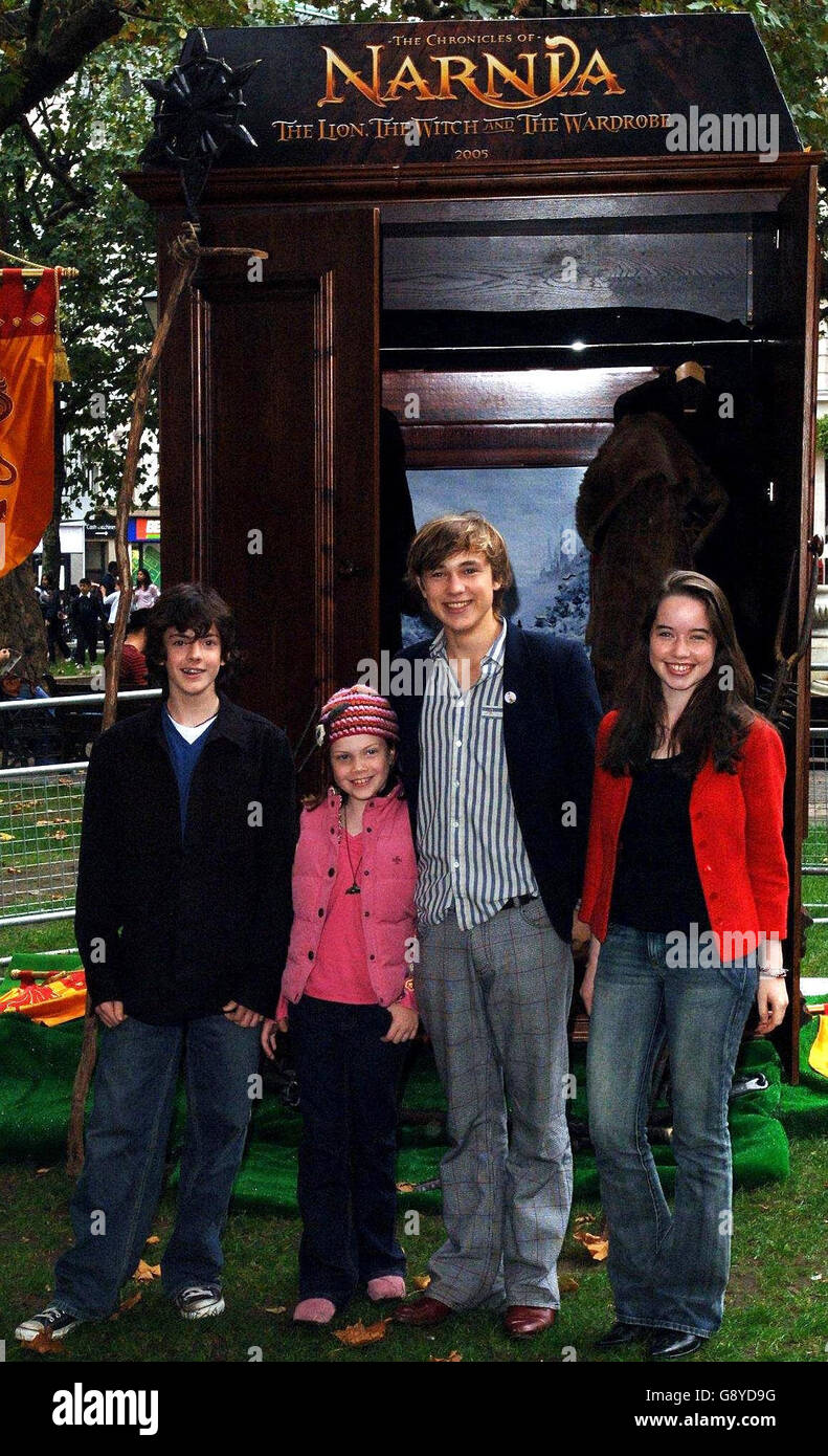 Stars from the new film 'The Chronicles of Narnia' - From left; Skandar Keynes (Edmund), William Moseley (Peter), Georgie Henly (Lucy, front) and Anna Popplewell (Susan) during the launch of the tenth National Schools Film Week at the Odeon Cinema in Leicester Square, central London, Wednesday 12 October 2005. See PA story SHOWBIZ Narnia. PRESS ASSOCIATION Photo. Photo Credit should read: Steve Parsons/PA. Stock Photo