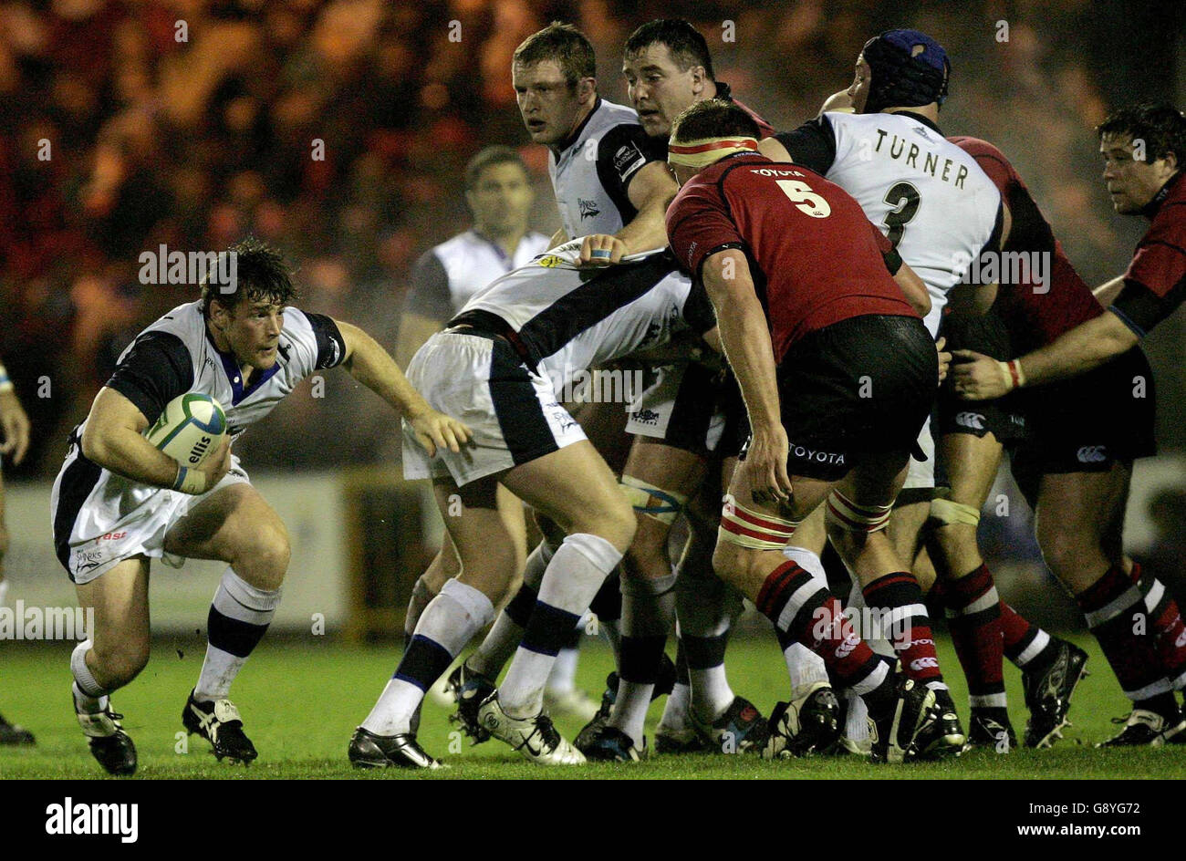 Sale Sharks' Andy Titterrell sneaks through the Munster defence during ...