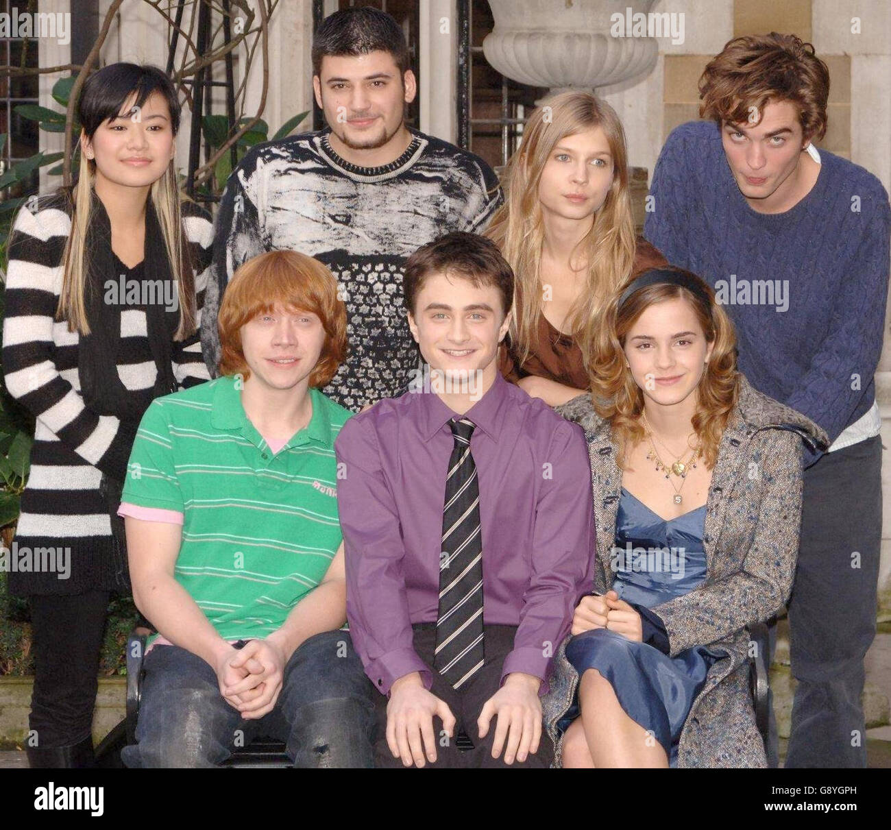 (Back row, left to right) Katie Leung, Stanislav Ianevski, Clemence Poesy and Robert Pattinson, (front row, left to right) Rupert Grint, Daniel Radcliffe and Emma Watson, during a photocall for the new Harry Potter film, 'Harry Potter and the Goblet of Fire', at the Merchant Taylor's Hall, central London, Tuesday 25 October 2005. PRESS ASSOCIATION Photo. Photo credit should read: Ian West/PA Stock Photo