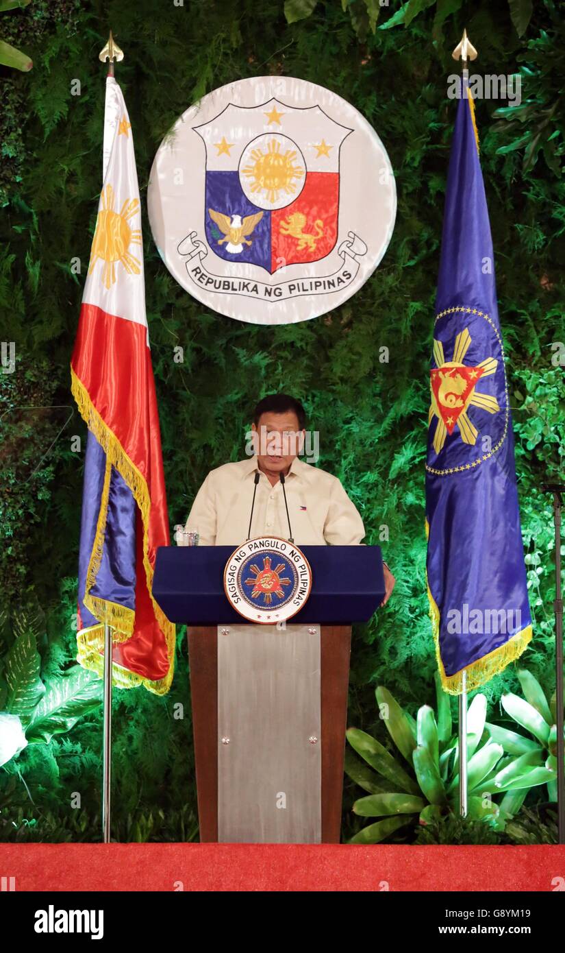 Manila, Philippines. 30th June, 2016. Rodrigo Duterte delivers his inaugural speech after taking oath at the Malacanang presidential palace in Manila, the Philippines, on June 30, 2016. Rodrigo Duterte was sworn in as the 16th president of the Philippines on Thursday. © Malacanang Photo Bureau/Xinhua/Alamy Live News Stock Photo