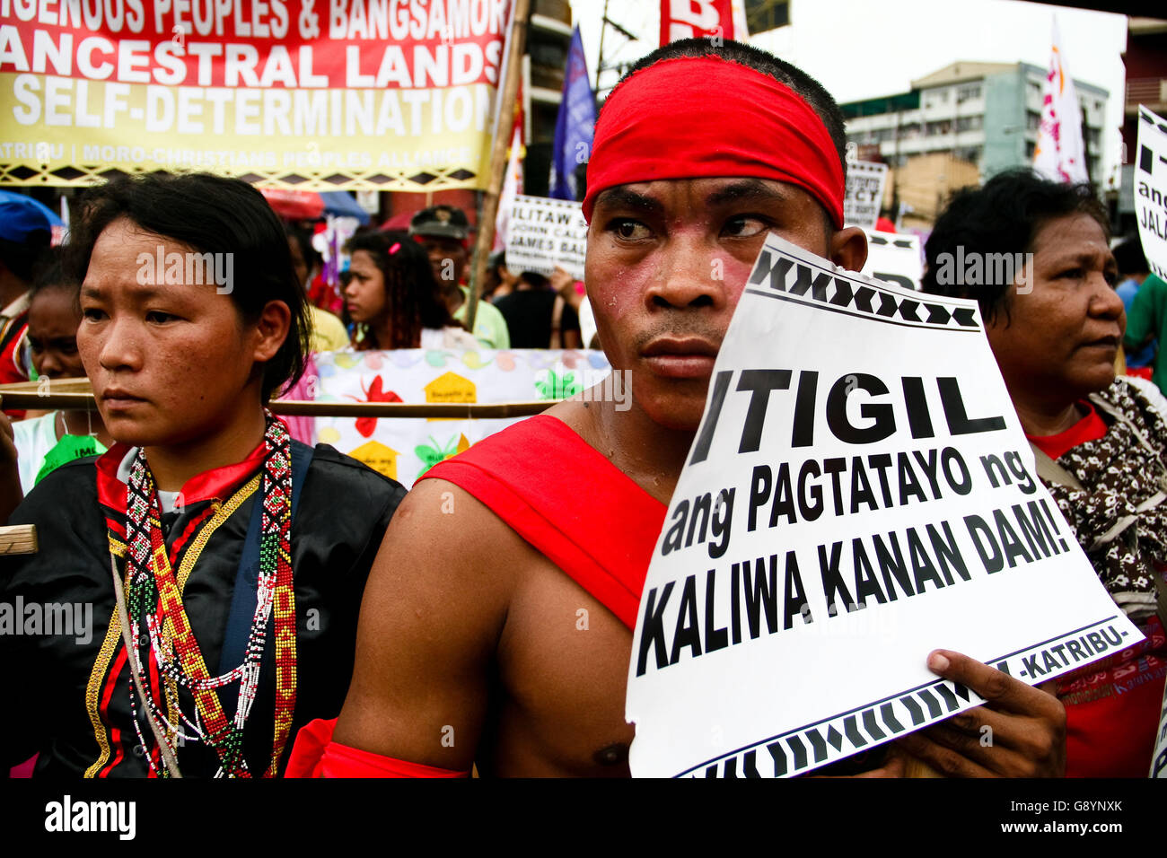 Philippines. 30th June, 2016. A group of Lumad (indigenous people) calling for the cease of construction of dams in their ancestral lands. Thousands marched to the Mendiola Bridge, near the Malacanang Palace, to call on the newly elected president to implement the changes within the government and to stand as a pro-people administration. The march coincided with Duterte's inauguration as the 16th president of the Republic of the Philippines. Credit:  J Gerard Seguia/ZUMA Wire/Alamy Live News Stock Photo