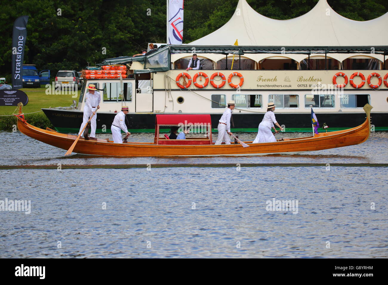 Rowers from all over the world came to the annual Henley Royal Regatta 2016. A gondola makes its regular appearance. Stock Photo