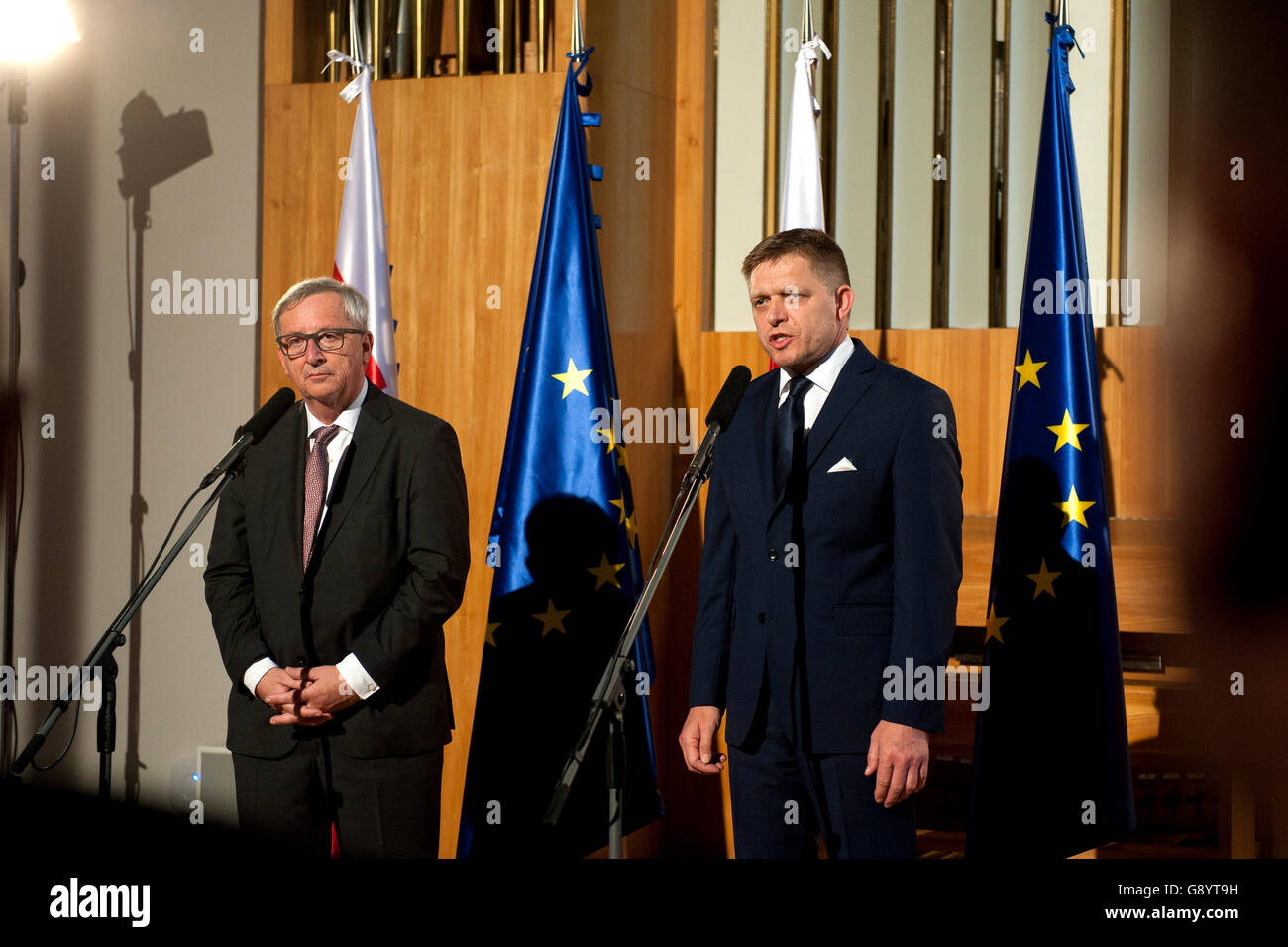 Slovakia's forthcoming EU presidency will be successful, President of the European Commission Jean-Claude Juncker, left, now on a visit to the country, said today, on Thursday, June 30, 2016. As of Friday, Slovakia will hold the EU presidency for the next six months. Prime Minister Robert Fico, right, said Slovakia wanted to focus on positive topics and to bring the European agenda closer to the public. Slovakia is taking up the EU presidency in the shadow of the outcome of the British referendum that has started a debate about the future form of the EU. (CTK Photo/Martin Mikuta) Stock Photo