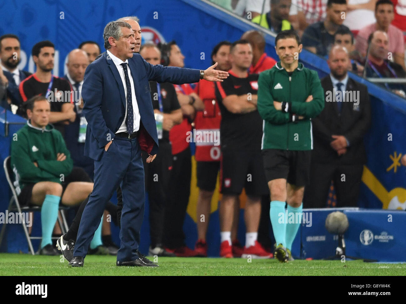 Marseille, France. 30th June, 2016. Coach Fernando Santos (L) of Portugal gestures during the UEFA EURO 2016 quarter final soccer match between Poland and Portugal at the Stade Velodrome in Marseille, France, 30 June 2016. Photo: Federico Gambarini/dpa/Alamy Live News Stock Photo
