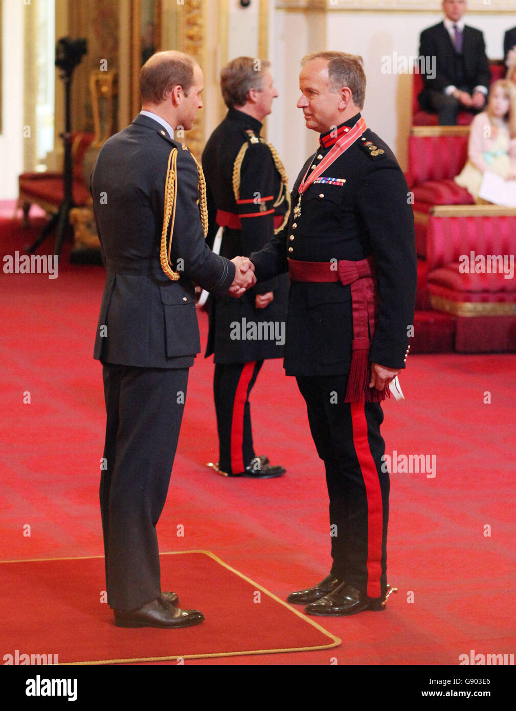 Brigadier James Stopford receives a CBE from the Duke of Cambridge
