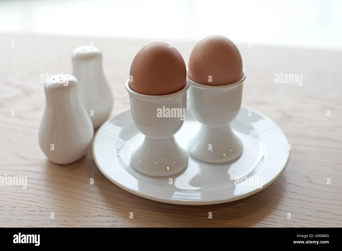 soft boiled egg in eggcup for breakfast meal Stock Photo