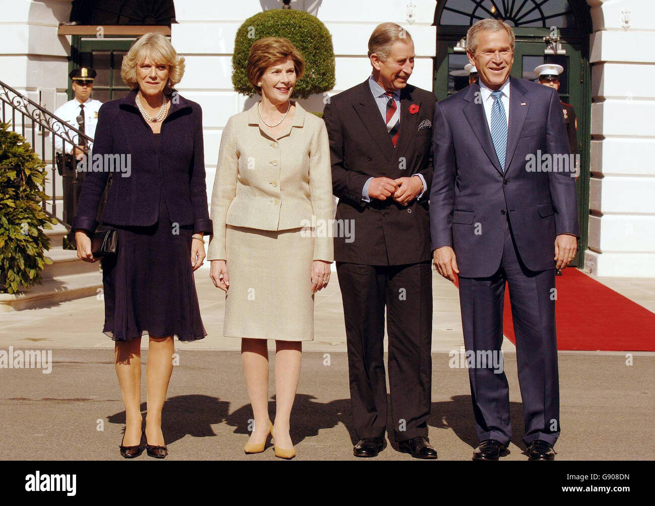 (L - r) The Duchess of Cornwall, Laura Bush, the Prince of Wales and President George W Bush on the South lawn of the White House in Washington DC, Wednesday November 2, 2005. The Prince and Duchess will take both lunch and dinner with the President after arriving from New York, on the second day of their week-long trip to the USA. See PA story ROYAL Charles. PRESS ASSOCIATION Photo. Photo credit should read: John Stillwell/PA. Stock Photo