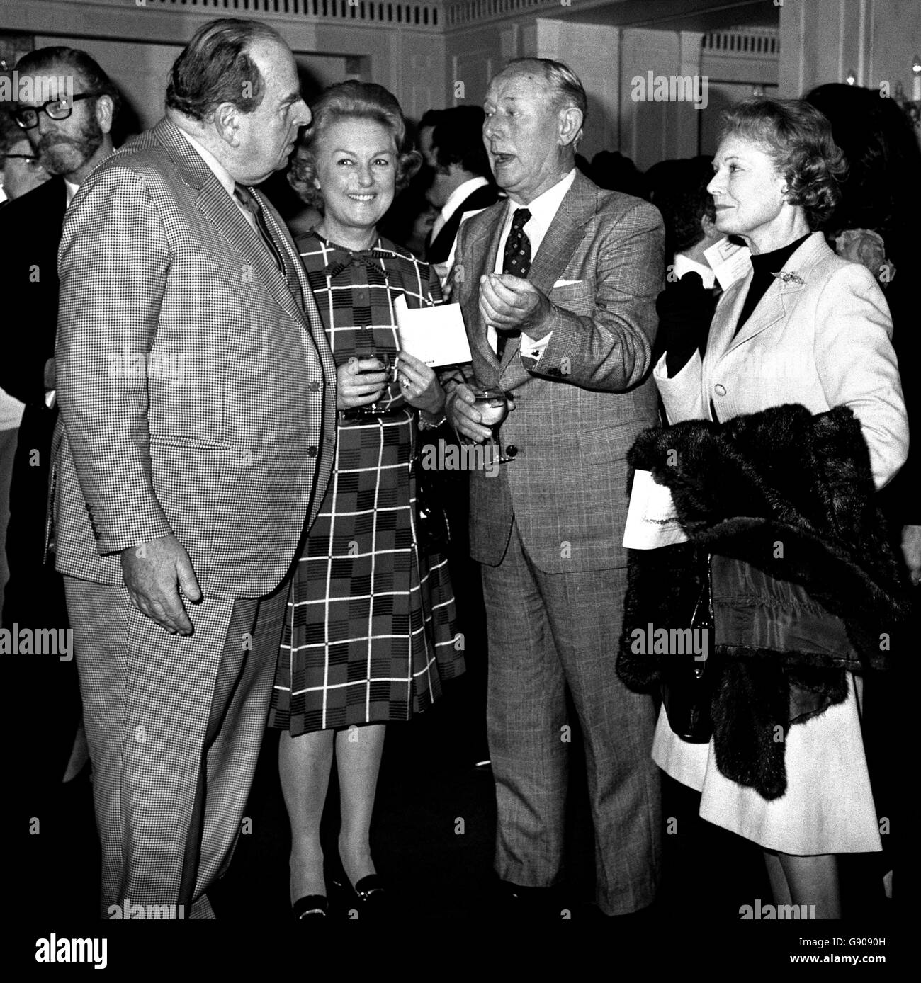 (left to right) Actor, dramatist and raconteur, Robert Morley; Yvonne, wife of Richard 'Mr Pastry' Hearne, and Dame Anna Neagle. The lunceon honours Mr Morley, his daughter-in-law Margaret, and his son Sheridan Morley. Robert is the author of Morley Marvels. Margaret, authoress of A Friend In Need, and Sheridan, author of Oscar Wilde, and Marlene Dietrich. Stock Photo