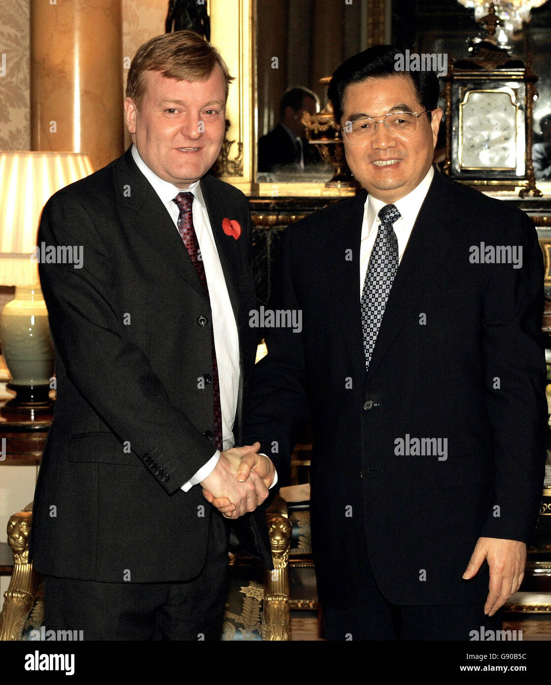 Britain's Liberal Democrat Leader Charles Kennedy (Left) meets the Chinese President Hu Jintao (Right) in Buckingham Palace, central London, Tuesday November 8, 2005. Hundreds of demonstrators from the Free Tibet Campaign, which called for an end to Chinese occupation of Tibet, packed London's Mall to make their presence known to the leader. See PA Story ROYAL China. PRESS ASSOCIATION Photo. Photo credit should read: Paul Hackett/PA/WPA Pool/Reuters Stock Photo